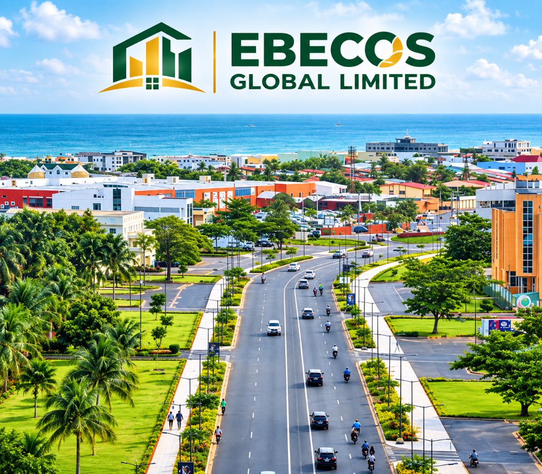 Ebecos Global Limited — serviced land beside a dual carriageway with coastal city development beyond